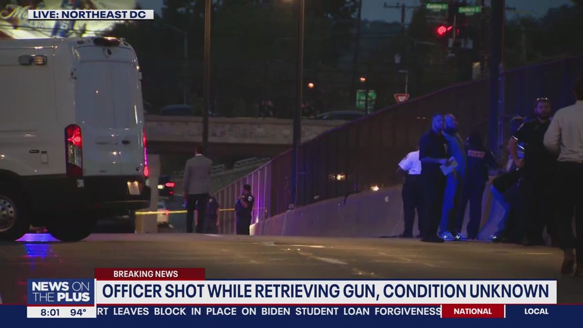 DC police officer shot while retrieving gun; condition unknown